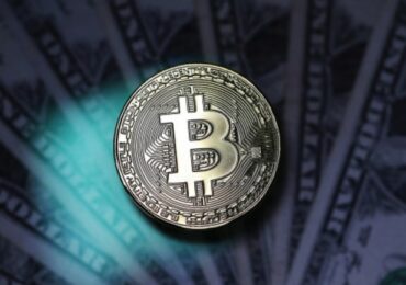 Bitcoin's market value tops $1 trillion